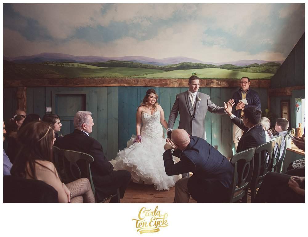 Bride and groom celebrate after getting married at Hopkins Vineyard CT