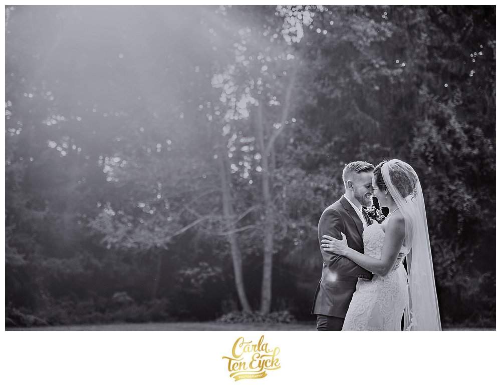 A couple embraces happily after their wedding at the Webb Barn in Wethersfield CT