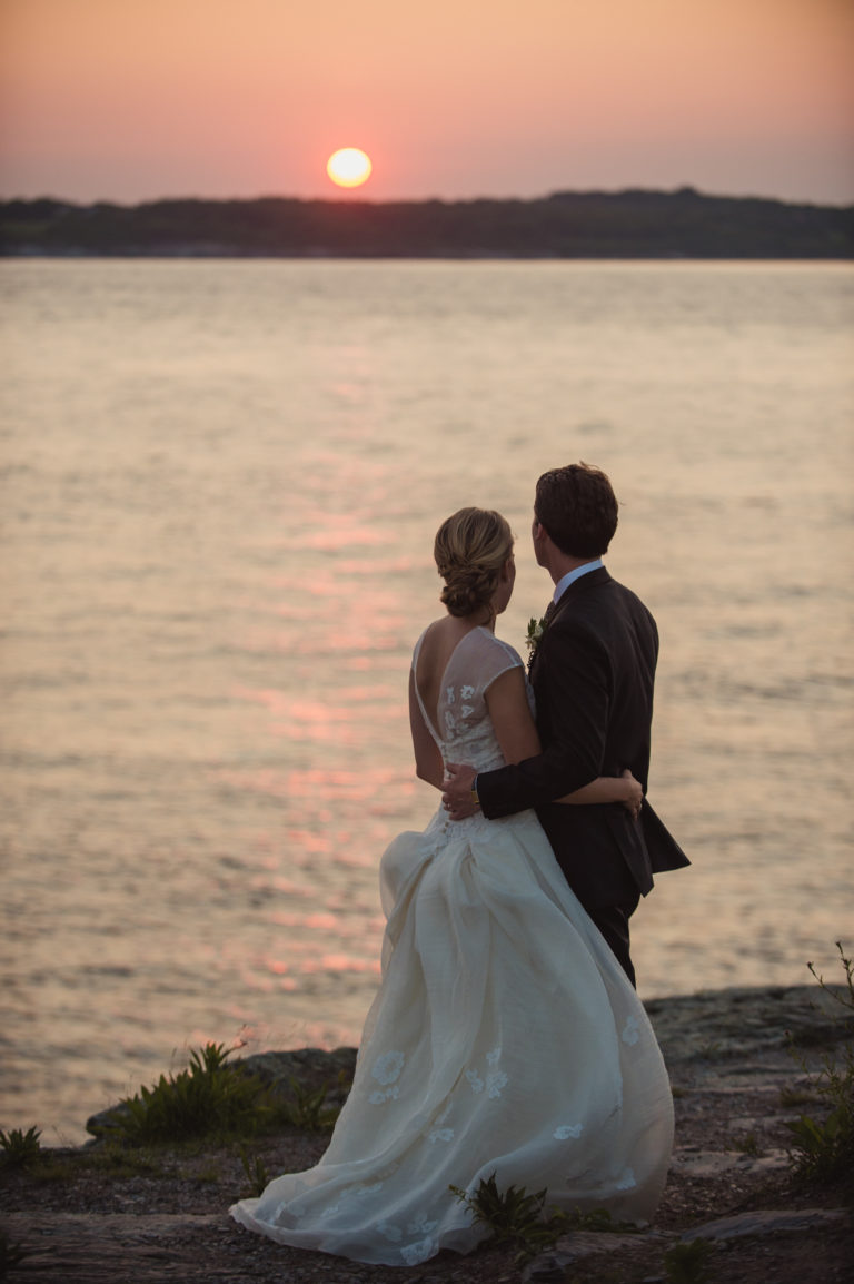 Bride and groom at sunset at their wedding at Castle Hill Inn Newport RI