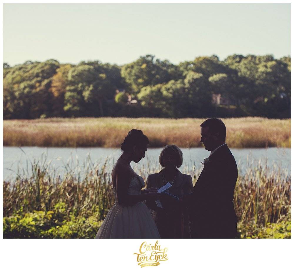 Wedding ceremony by the Lieutenant River at the Bee and Thistle Inn, Old Lyme CT