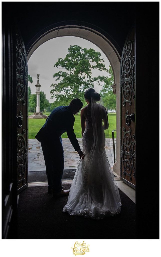 Bride and groom exit the Pomfret Chapel on their rainy wedding day, Pomfret CT