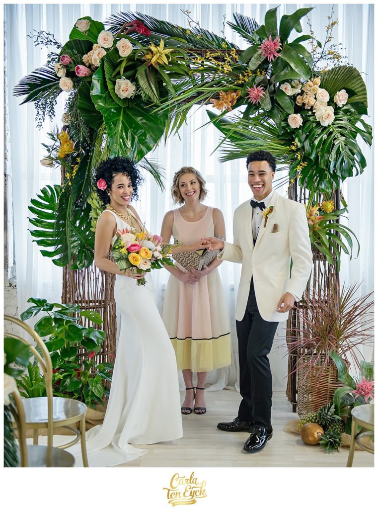 A bride and groom at the altar of their Cuban Inspired styled shoot at Gather and Lounge in Bridgeport CT
