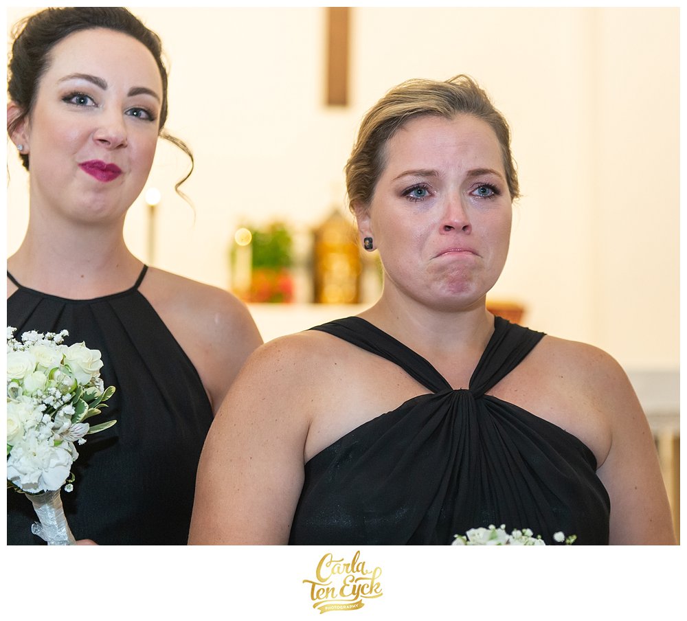 Bridesmaid cries watching her sister walk down the aisle alone on her wedding day in Lordship CT