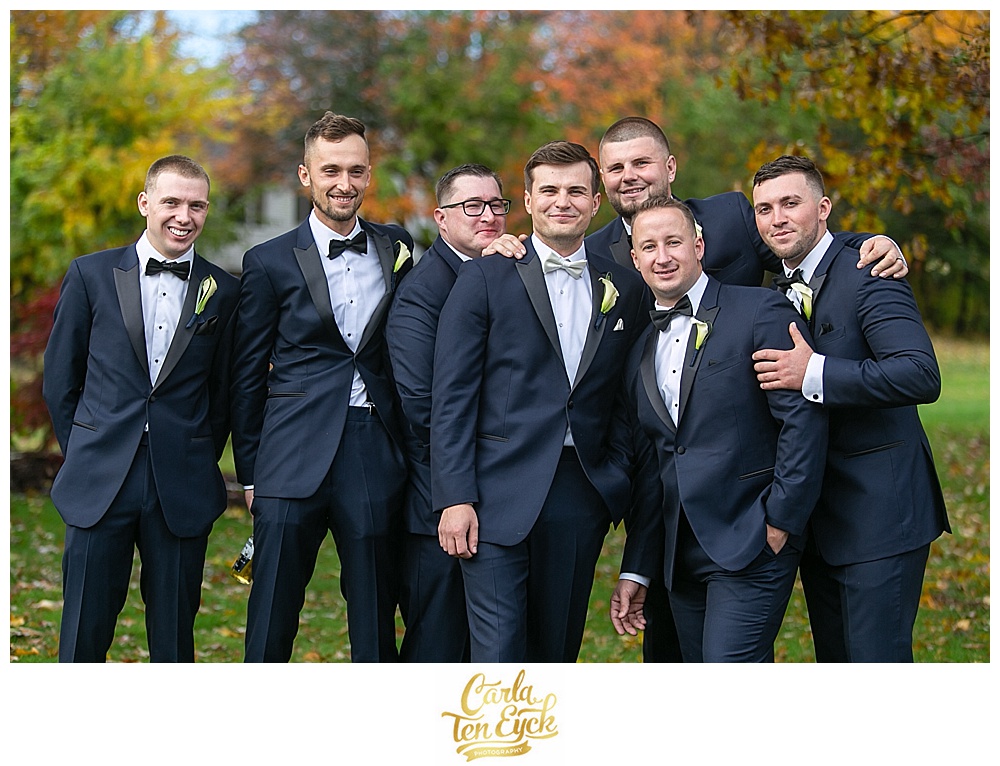 Groomsman at an autumn wedding at Aria in Prospect CT
