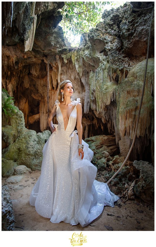 Bride in Kleinfeld wedding gown at the Crystal Caves on Grand Cayman for Cayman Vows Magazine