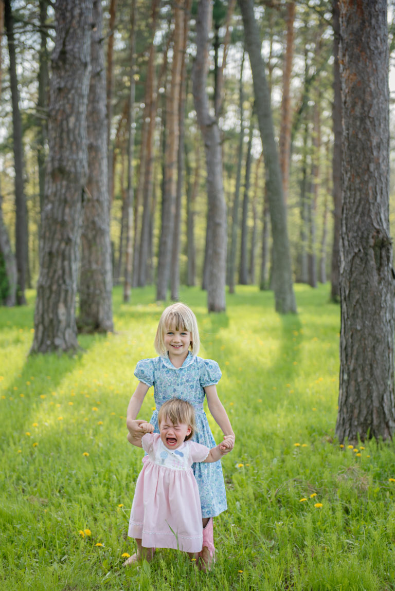 Family portrait with two little girls at High Acres Farm in Shelburne VT