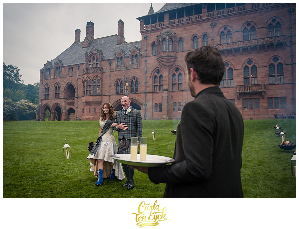 Bride and groom arrive to their wedding at Mount Stuart on the Isle of Bute Scotland