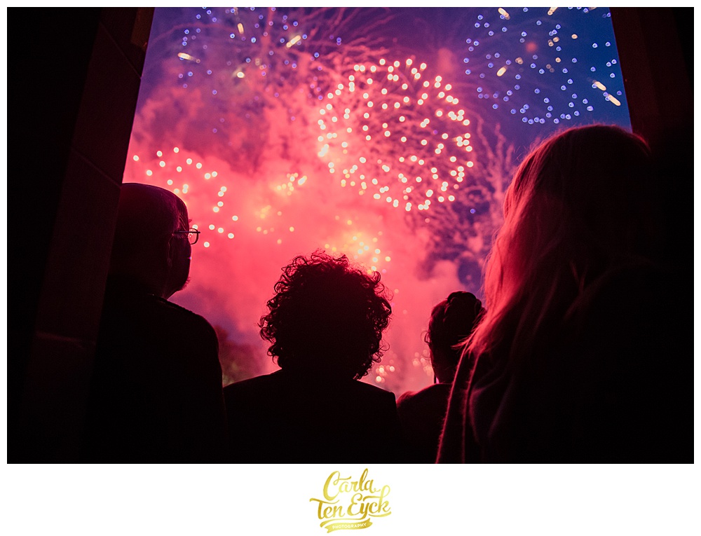 Guests watch fireworks at a wedding at Mount Stuart on the Isle of Bute Scotland