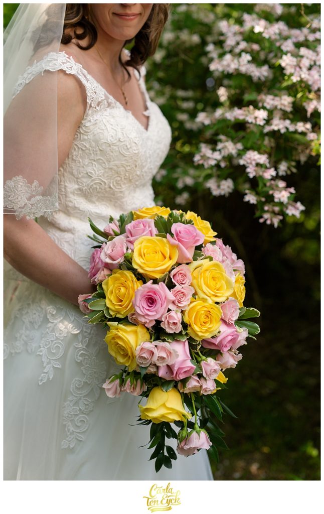 Yellow and pink roses in wedding bouquet