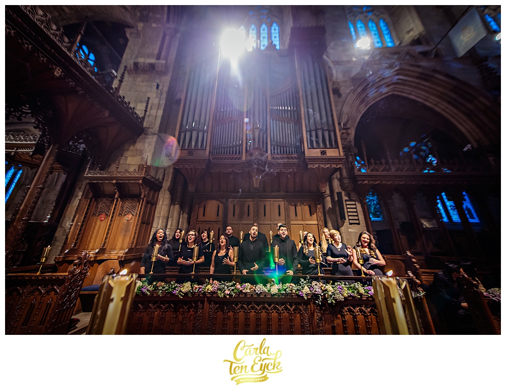 Choir sings during wedding at Selby Abbey Yorkshire UK