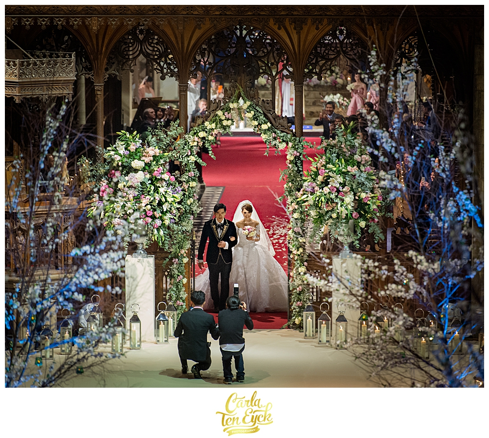 Jay Chou and his new wife Hannah walk down the aisle at Selby Abbey Yorkshire UK