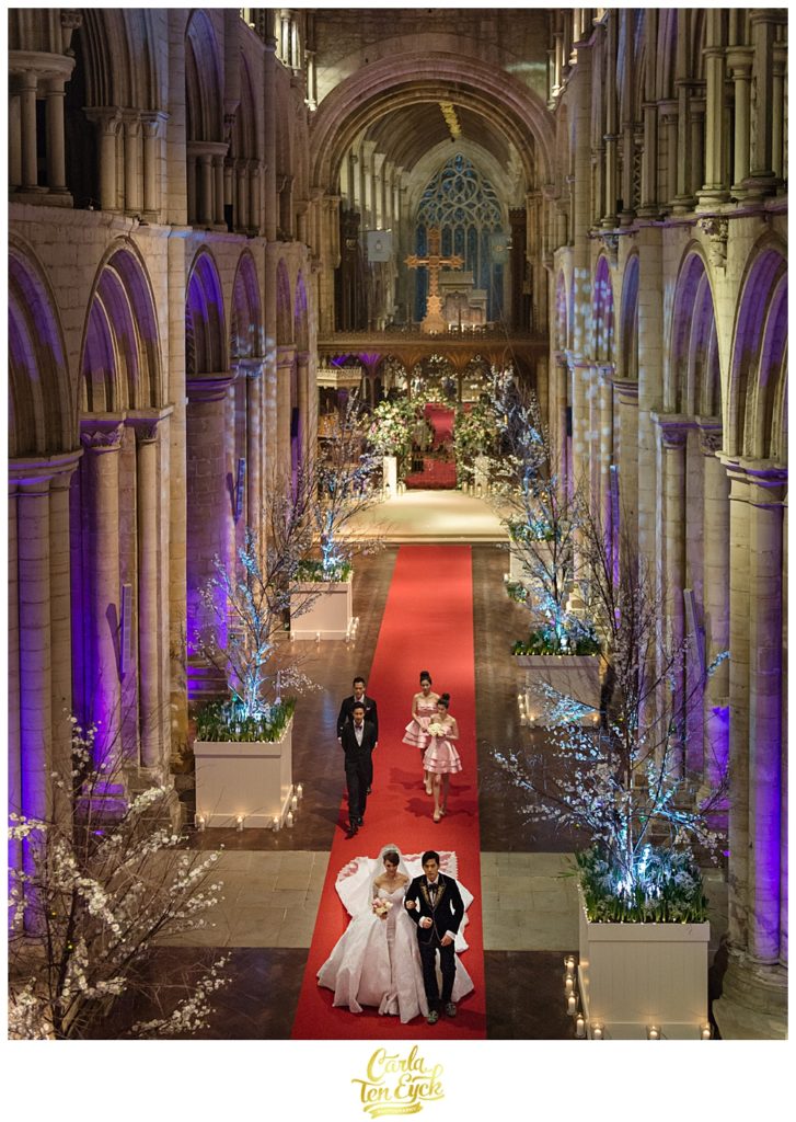 Jay Chou and his new bride walk down the aisle at Selby Abbey in Yorkshire UK