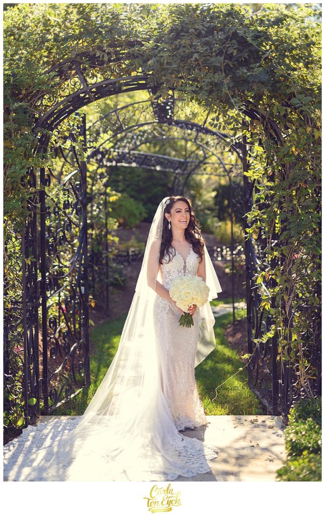 A happy bride basks in the sunlight at her wedding at Aria in Prospect CT