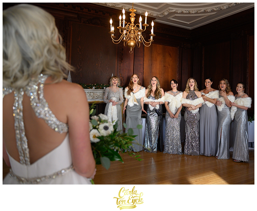 Bride reveals herself to her bridesmaids at her winter wedding at the Branford House in Groton CT