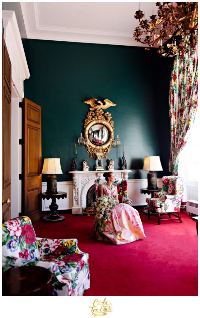 A bride poses in one of the colorful rooms at The Greenbrier in West Virginia