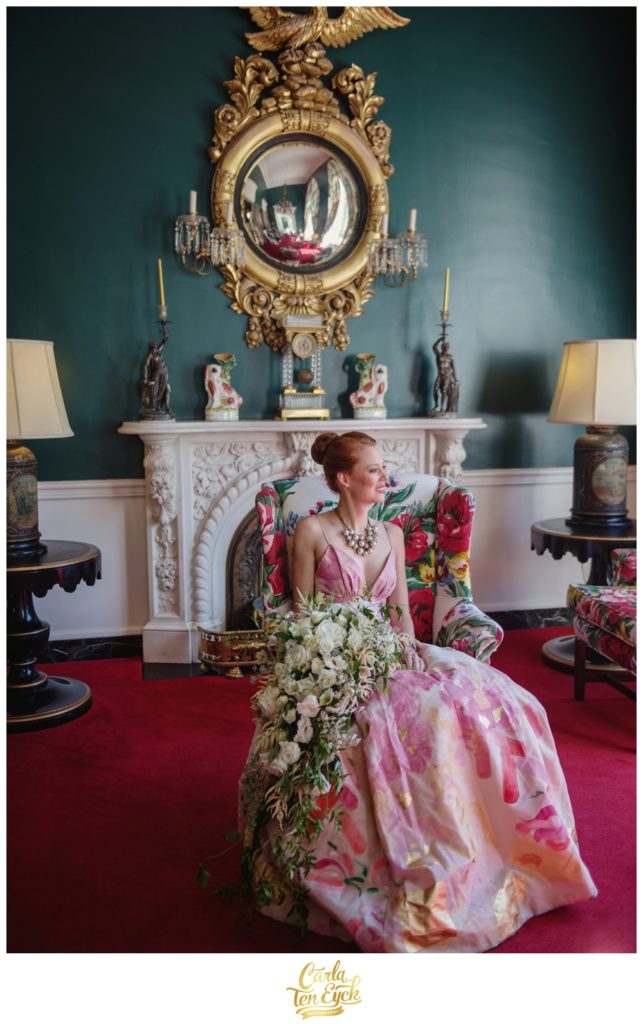 A bride poses in one of the colorful rooms at The Greenbrier in West Virginia