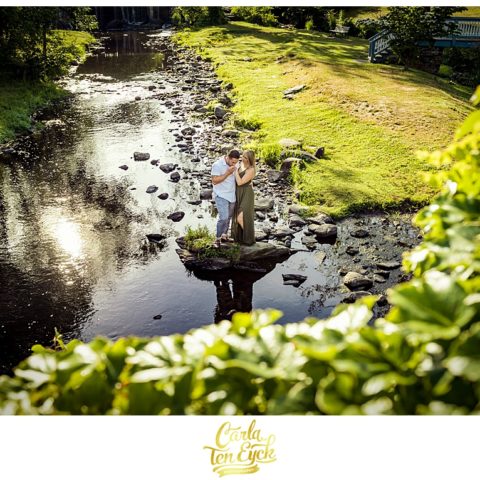 A couple enjoys the waterfalls during their Milford CT engagement session
