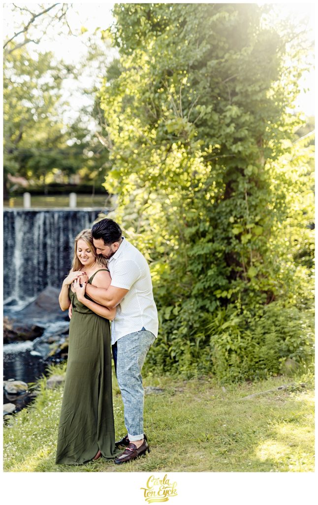 A couple embraces during their Milford CT engagement session