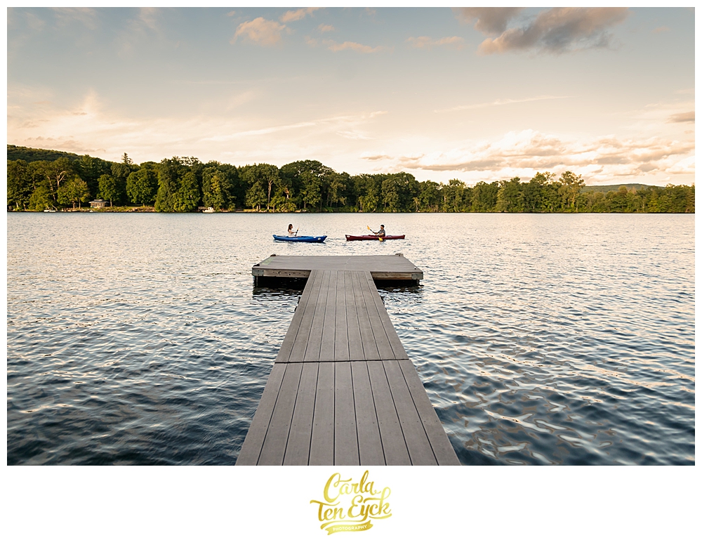 A couple kayaks on Lake Waramaug CT during their engagement session