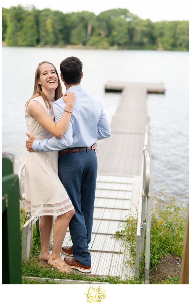 Couple laughs during their engagement session on Lake Waramaug CT