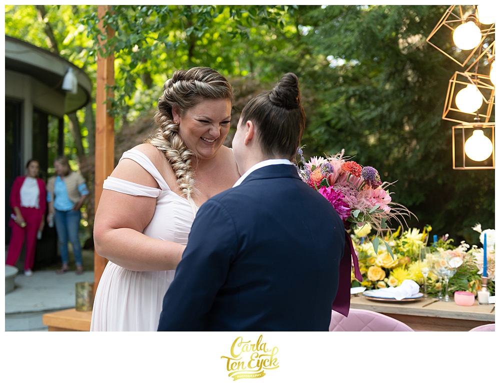 Two brides kiss at their LGBTQ Wedding with Amy Champagne Events