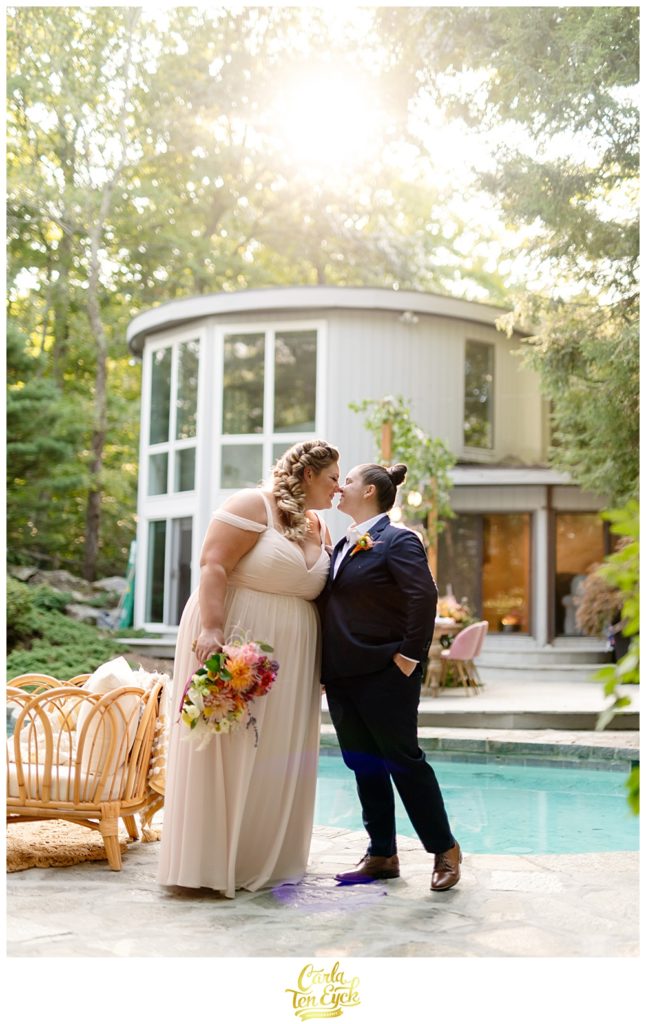 Two brides pose for photos during their LGBTQ wedding in Weston CT