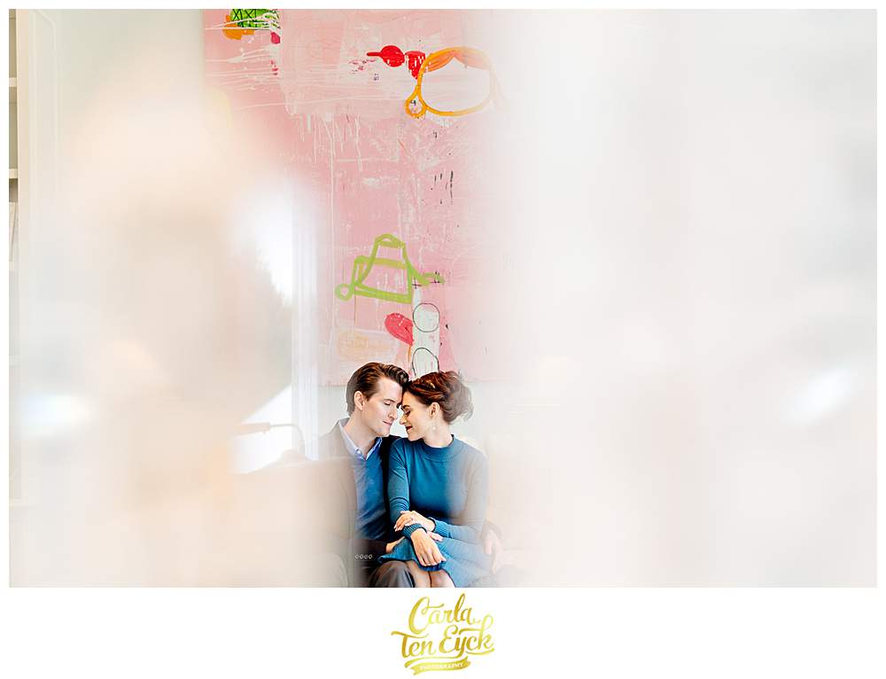 a bride and groom cuddle at their intimate wedding at The Mayflower Inn and Spa in Washington CT