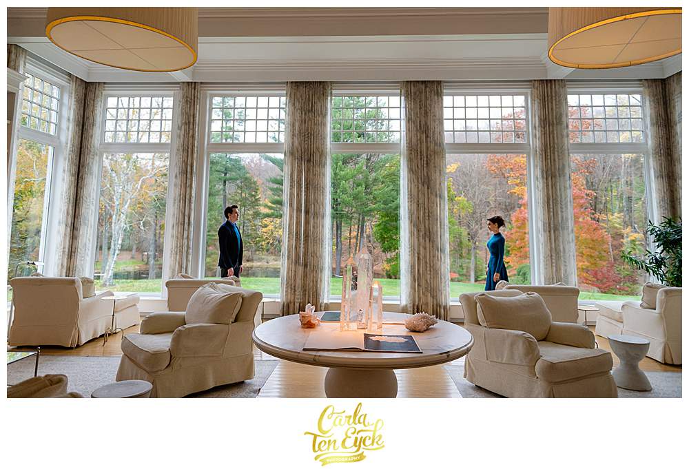 A bride and groom pose for photos at their intimate wedding at the Mayflower Inn and Spa in Washington CT