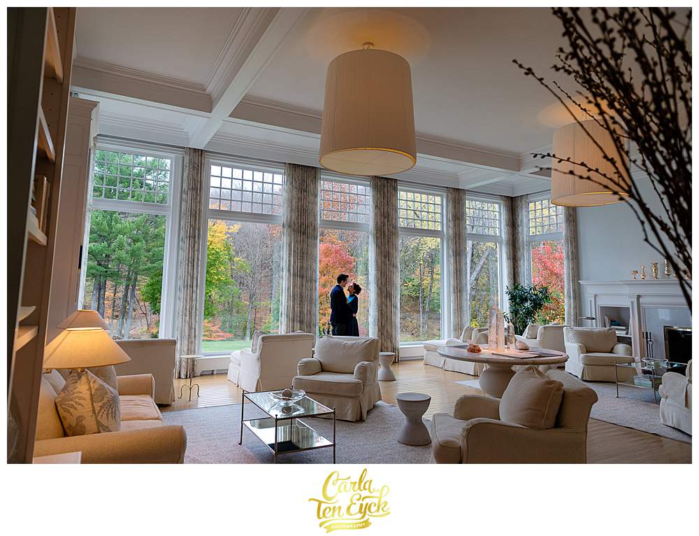 A bride and groom pose for photos at their intimate wedding at the Mayflower Inn and Spa in Washington CT