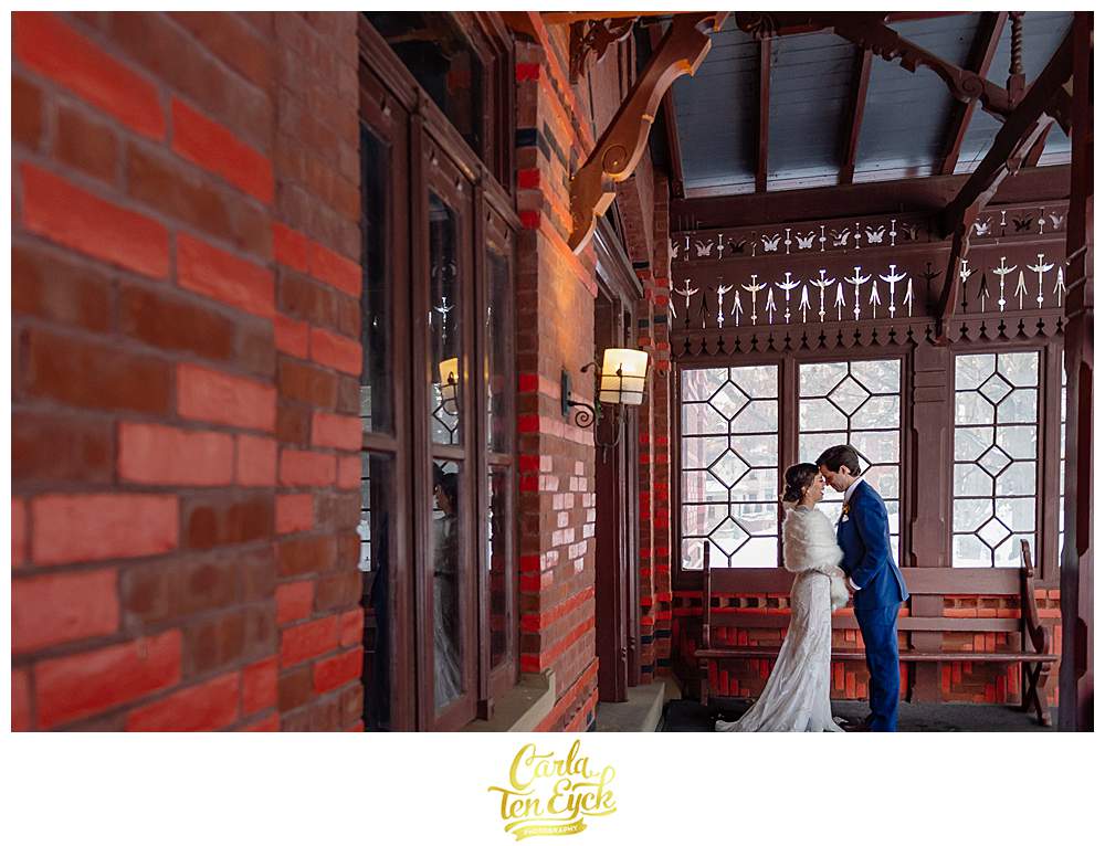 A bride and groom kiss on their wedding at The Mark Twain House in Hartford CT