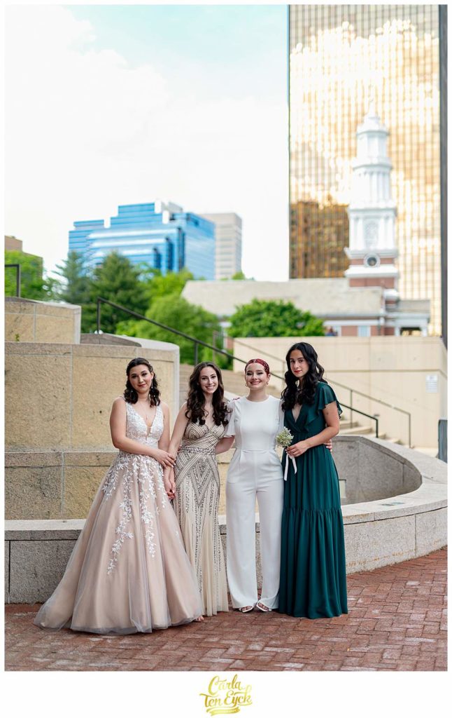 The girls pose for photos during their downtown hartford prom photo session in Hartford CT