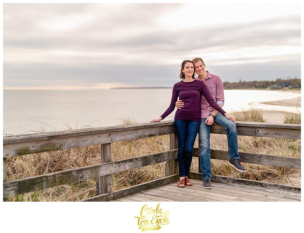 A couple during their spring Harkness Park engagement session on the beach in Waterford CT