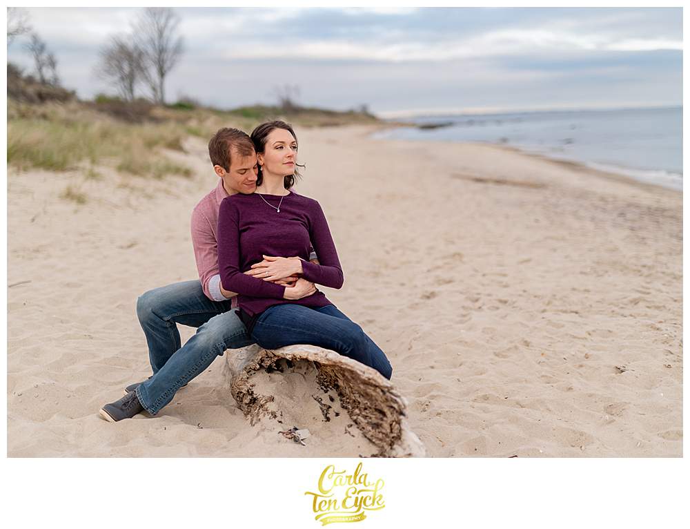 A couple during their spring Harkness Park engagement session on the beach in Waterford CT