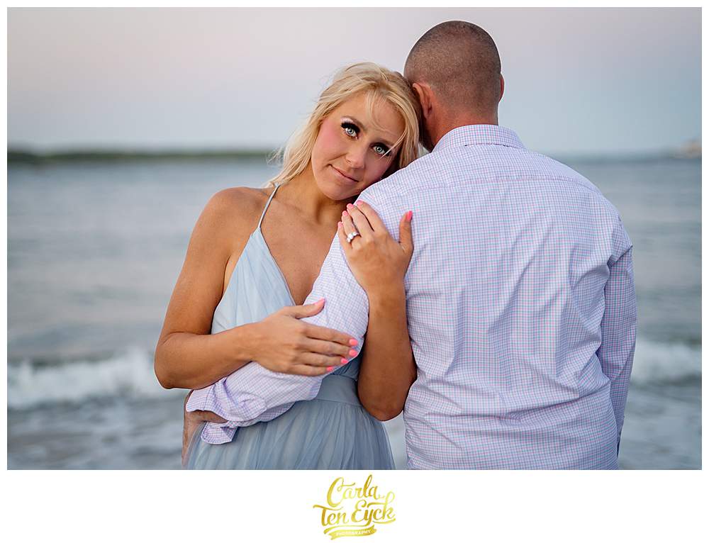 A couple poses for their engagement photos at Great Island Common in Portsmouth New Hampshire