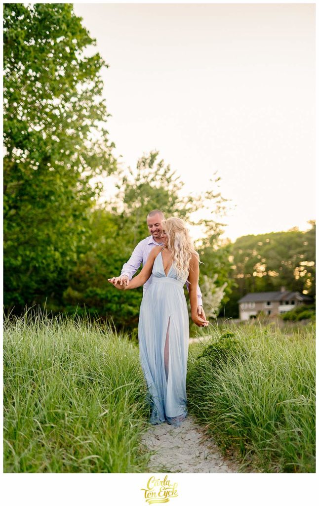 A couple poses for their engagement photos at Great Island Common in Portsmouth New Hampshire