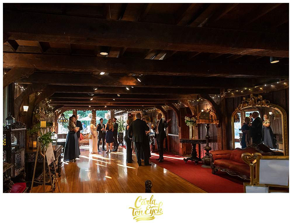 Guests enjoy cocktail hour at a Bill Miller's Castle wedding in Branford CT