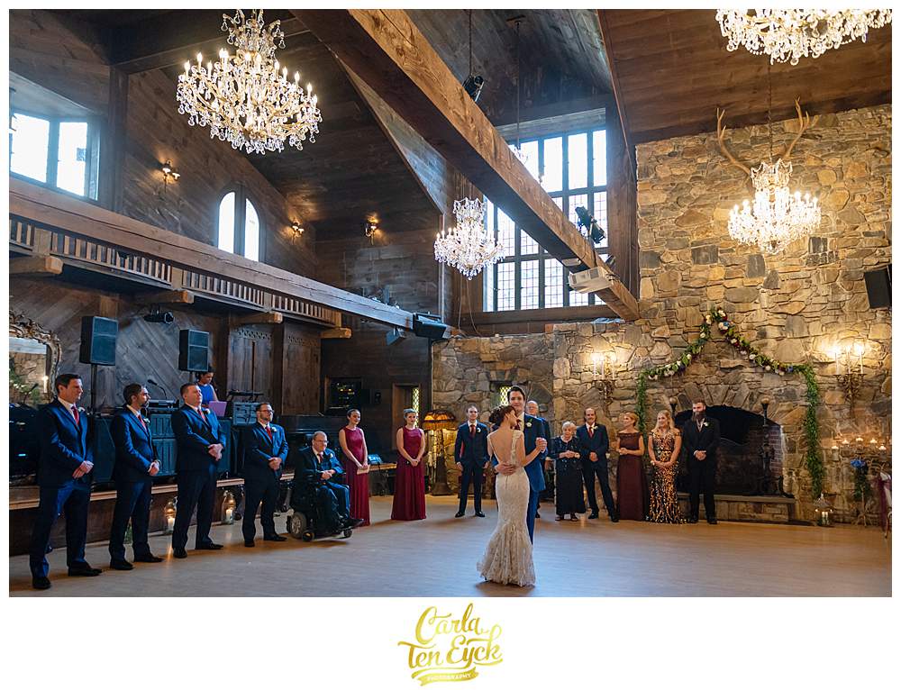 A bride and groom dance their first dance at their Bill Miller's Castle wedding in Branford CT