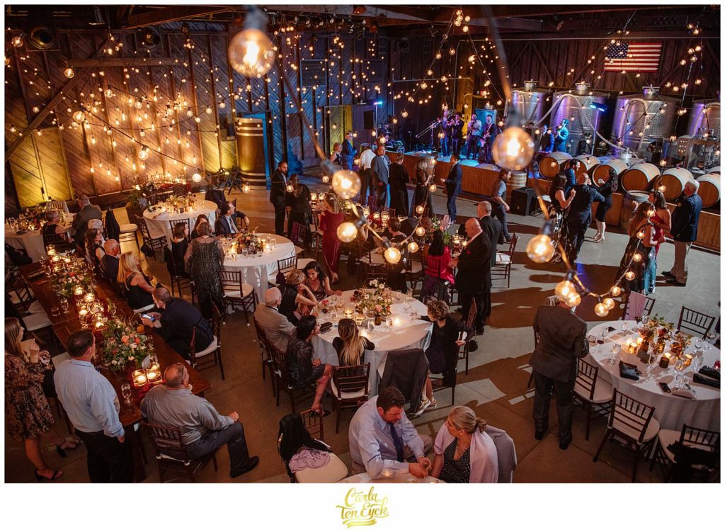 The party rages on during an autumn Saltwater Farm vineyard wedding in Stonington CT