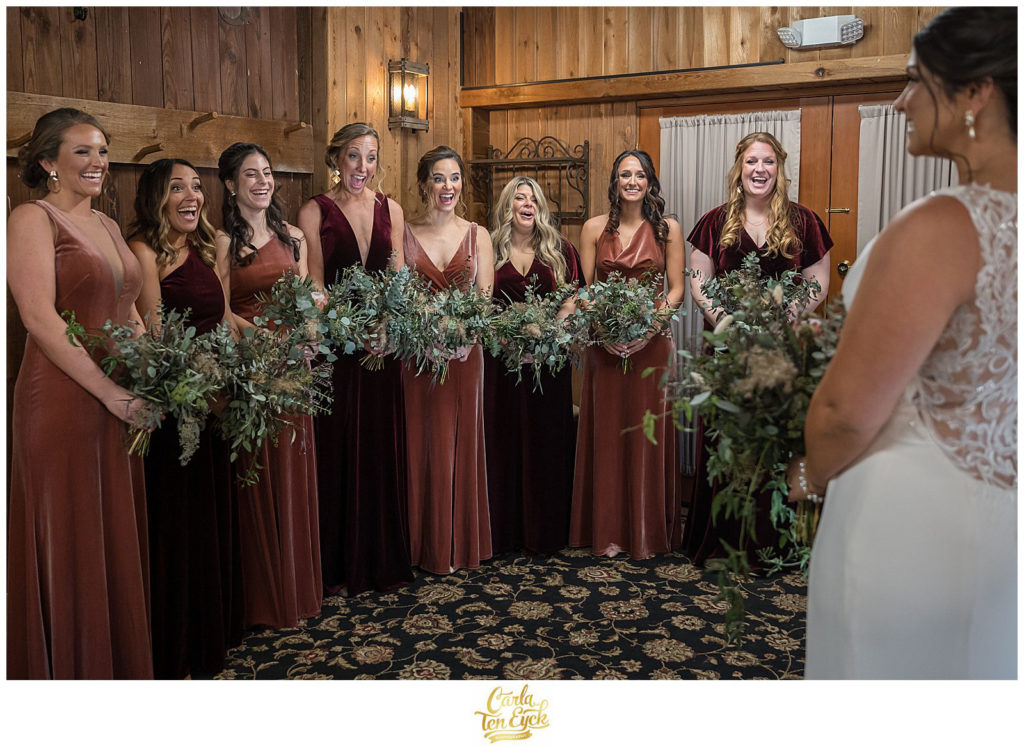 A bridesmaids reveal at their wedding at The Barns at Wesleyan Hills in Middletown CT