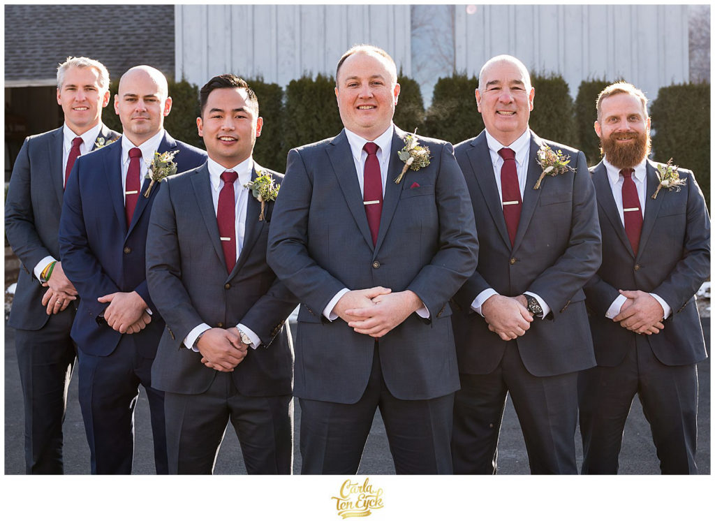 A groom with his groomsman at their wedding at The Barns at Wesleyan Hills in Middletown CT