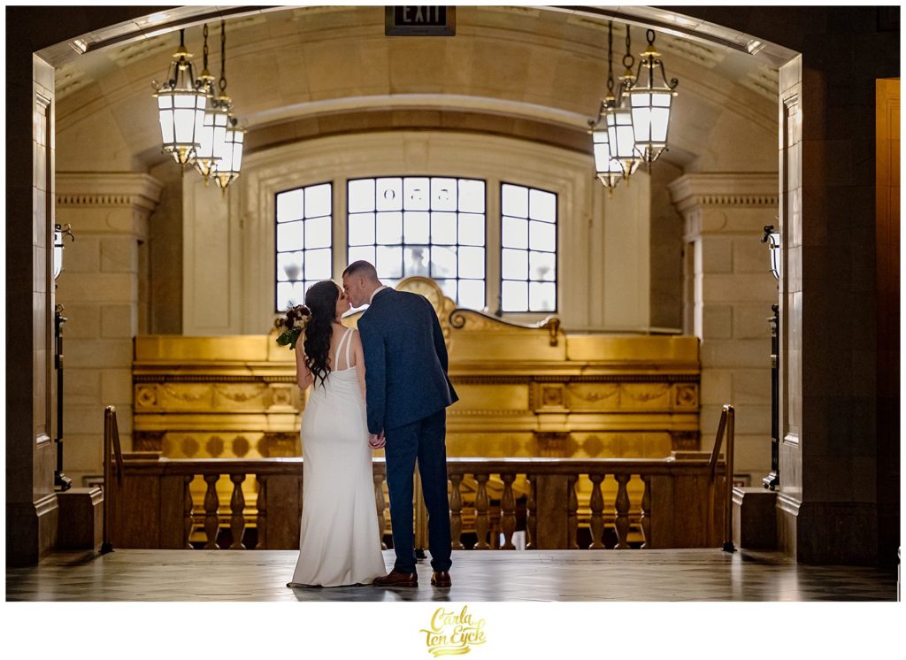 A couple kisses at their Hartford City Hall Spring elopement, in Hartford CT